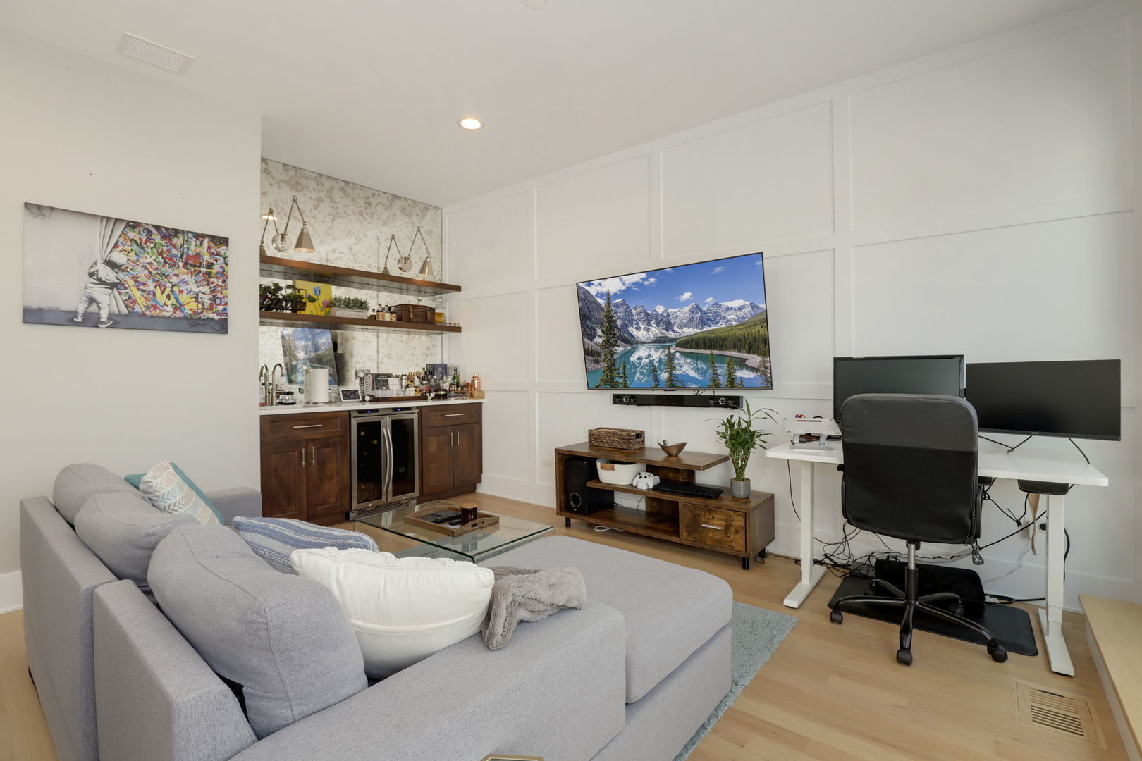 3048 West Lyndale Street, Unit 2 Chicago, IL 60647 - Photo 15 of 40 a living room with furniture and a flat screen tv