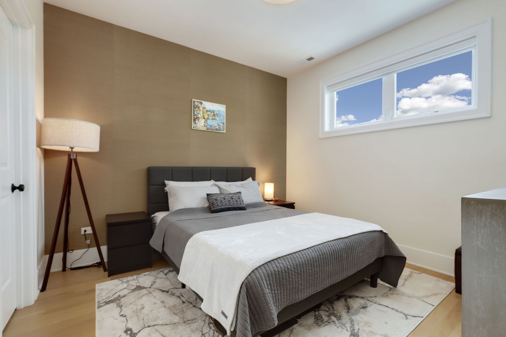 3048 West Lyndale Street, Unit 2 Chicago, IL 60647 - Photo 22 of 40 a bedroom with double bed and a window