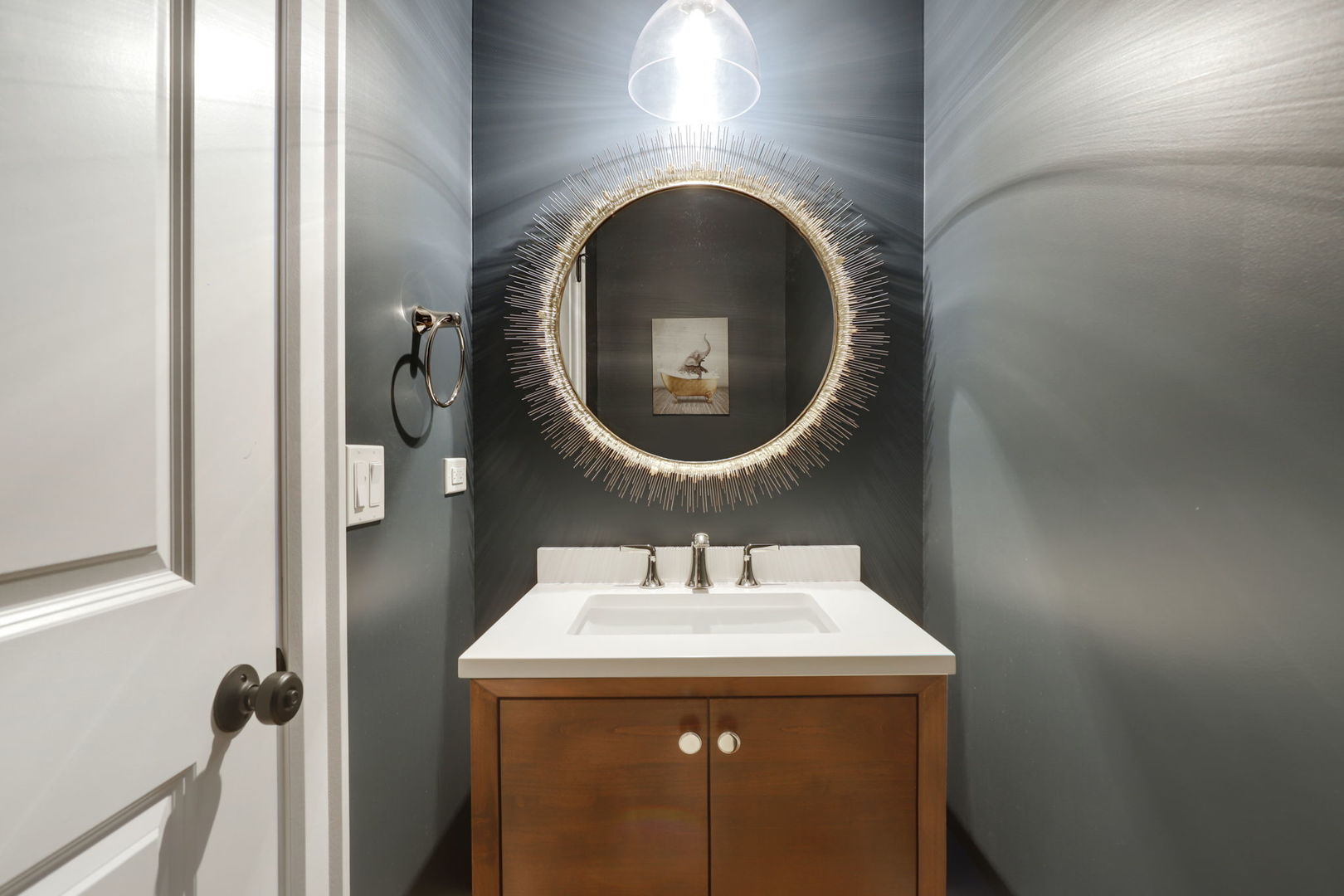 3048 West Lyndale Street, Unit 2 Chicago, IL 60647 - Photo 24 of 40 a bathroom with a sink and a mirror