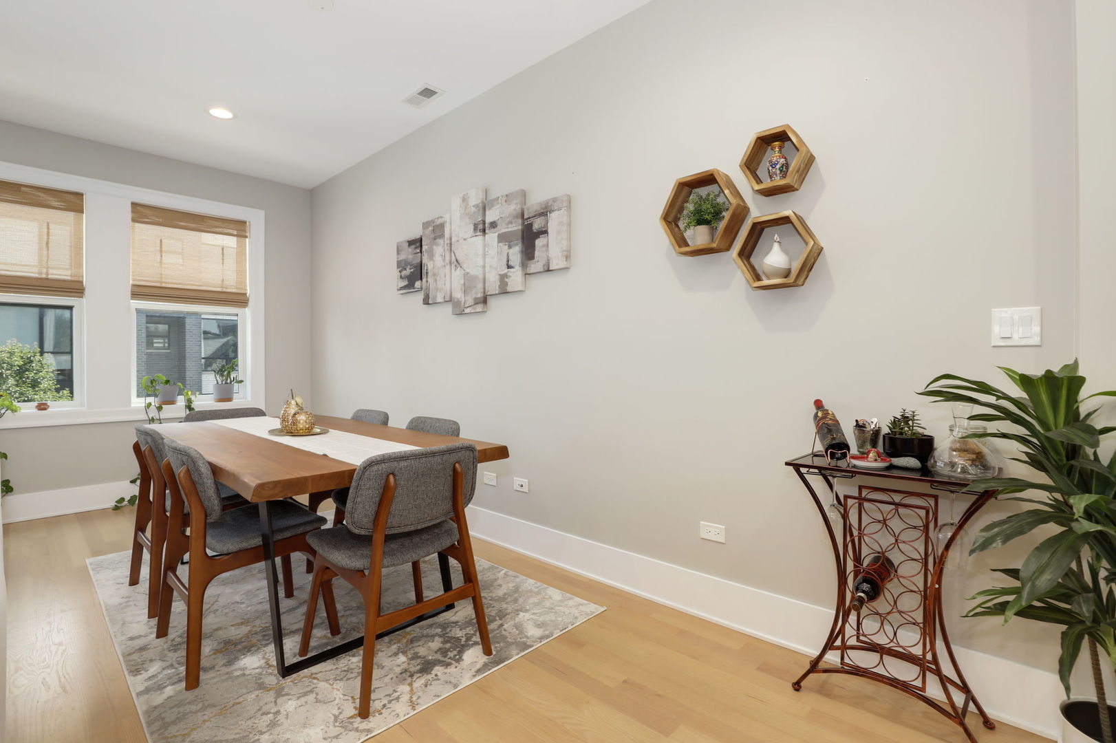 3048 West Lyndale Street, Unit 2 Chicago, IL 60647 - Photo 9 of 40 a view of a dining room with furniture and a window