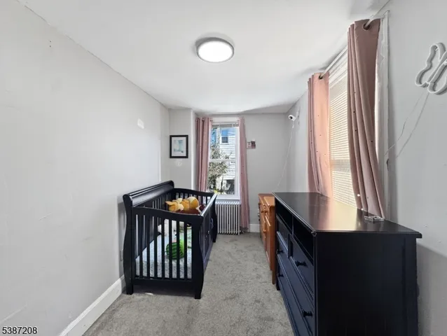 a room with furniture and window