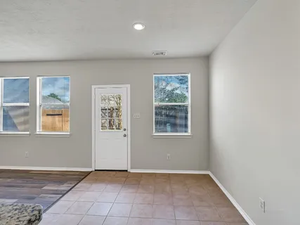 an empty room with windows