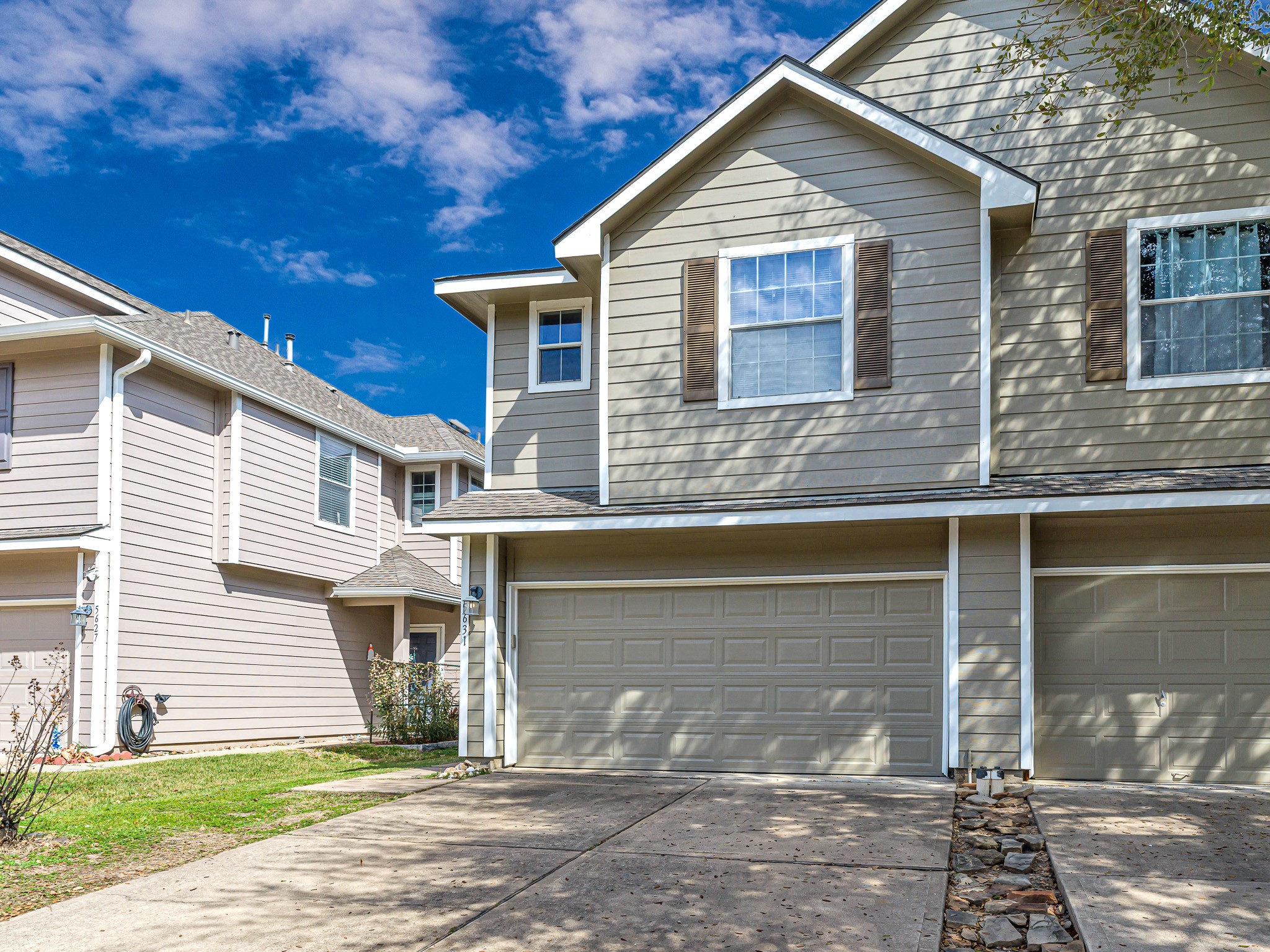 5631 Stonecloud Lane Katy, TX 77494 - Photo 2 of 31 a view of a house with a yard