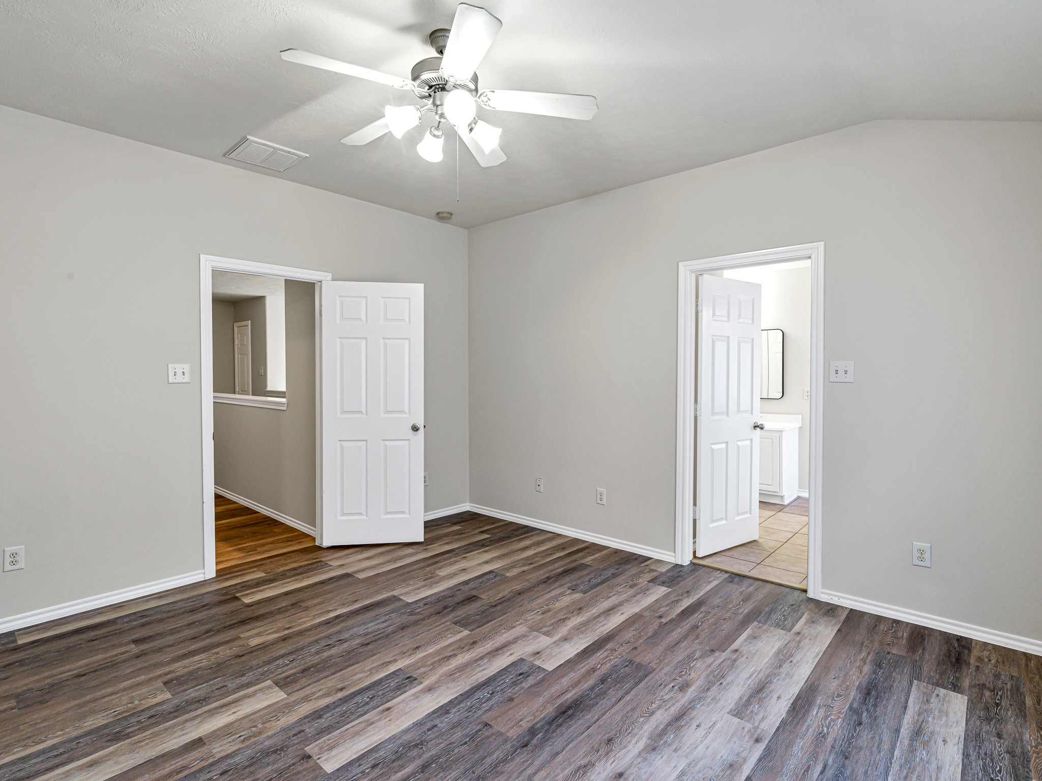 5631 Stonecloud Lane Katy, TX 77494 - Photo 24 of 31 a view of an empty room with wooden floor