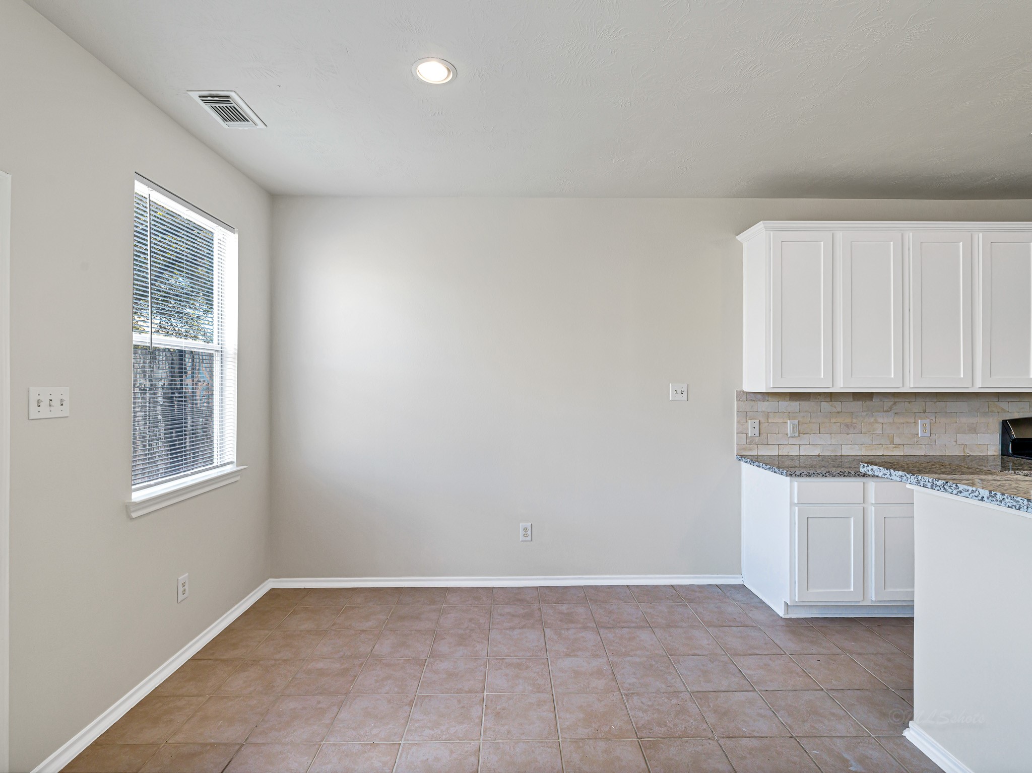 5631 Stonecloud Lane Katy, TX 77494 - Photo 10 of 31 an empty room with windows