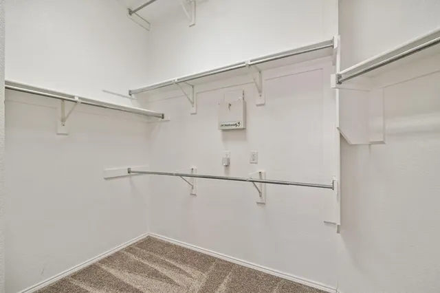 a view of small space with racks on the wall