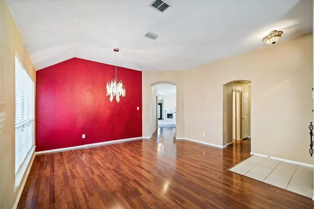 a view of a livingroom with wooden floor