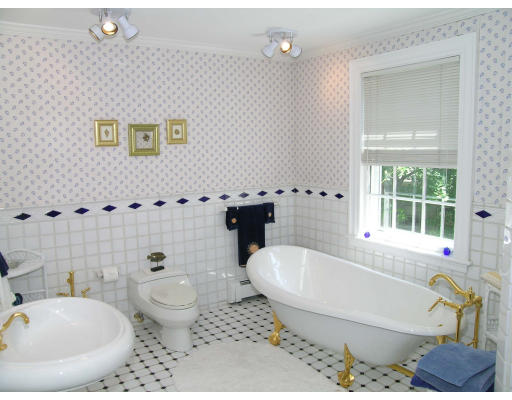 59 Wachusett Road Newton, MA 02467 - Photo 11 of 14 a bathroom with a sink and a bathtub