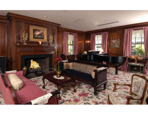 59 Wachusett Road Newton, MA 02467 - Photo 3 of 14 a living room with furniture a window and a fireplace