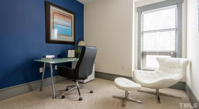 a kitchen with appliances cabinets and wooden floor