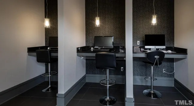 a room with furniture and flat screen tv