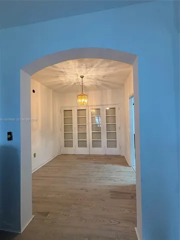 a view of empty room with windows