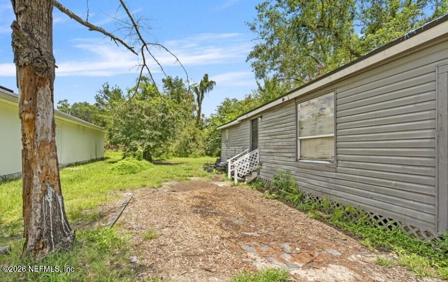 3131 Dignan Street Jacksonville, FL 32254 - Photo 13 of 16 a backyard of a house