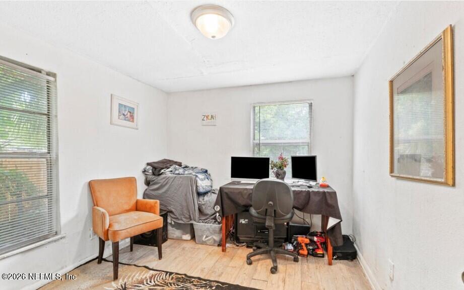 3131 Dignan Street Jacksonville, FL 32254 - Photo 9 of 16 a view of a workspace with furniture and a window