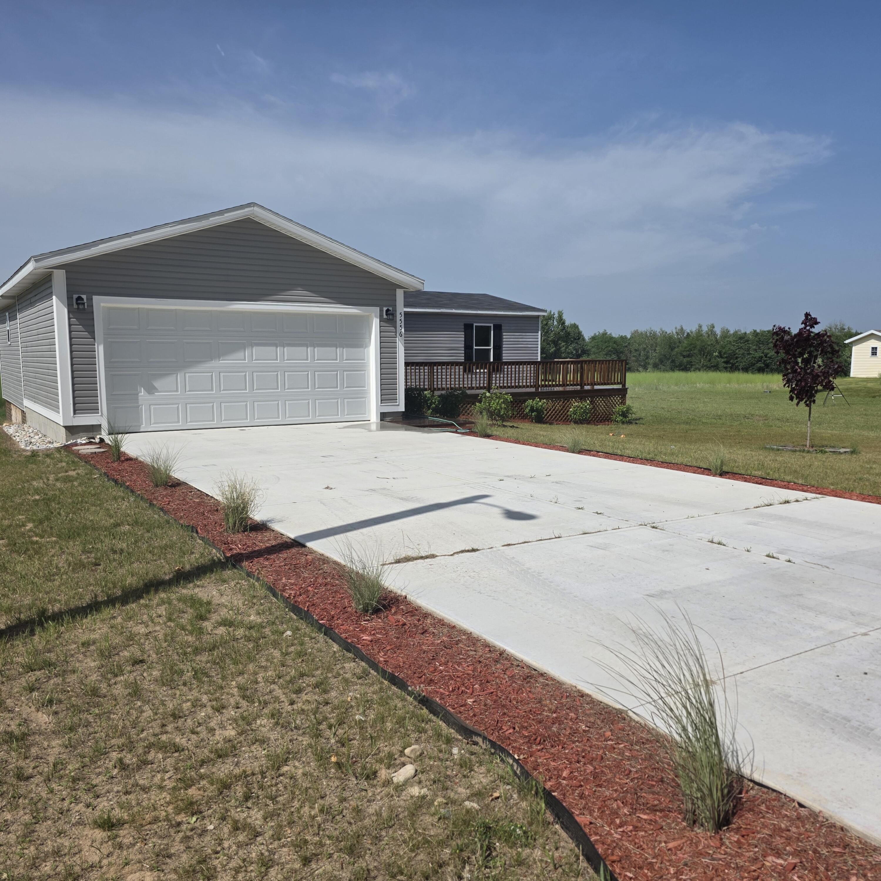 5556 West Lake Road Hart, MI 49420 - Photo 2 of 27 20260701_163217
