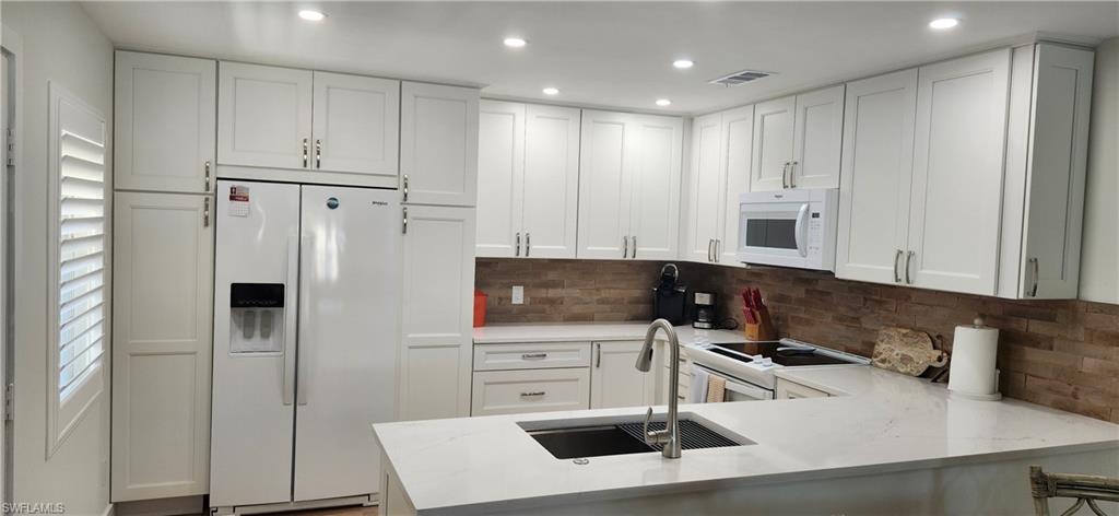 1051 Foxfire Lane, Unit 302 Naples, FL 34104 - Photo 2 of 37