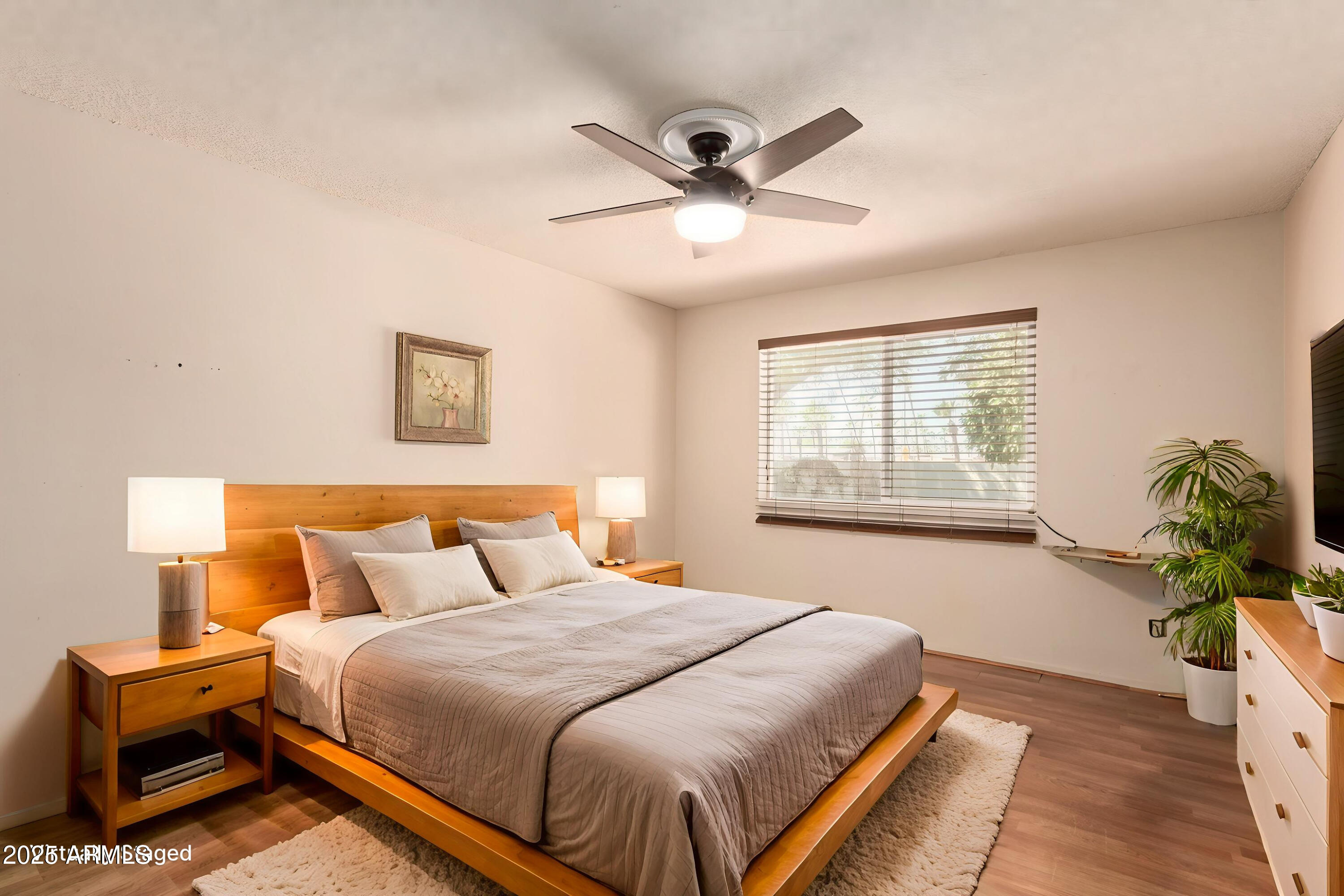 131 North Higley Road, Unit 1 Mesa, AZ 85205 - Photo 11 of 32 a bedroom with a bed and a window