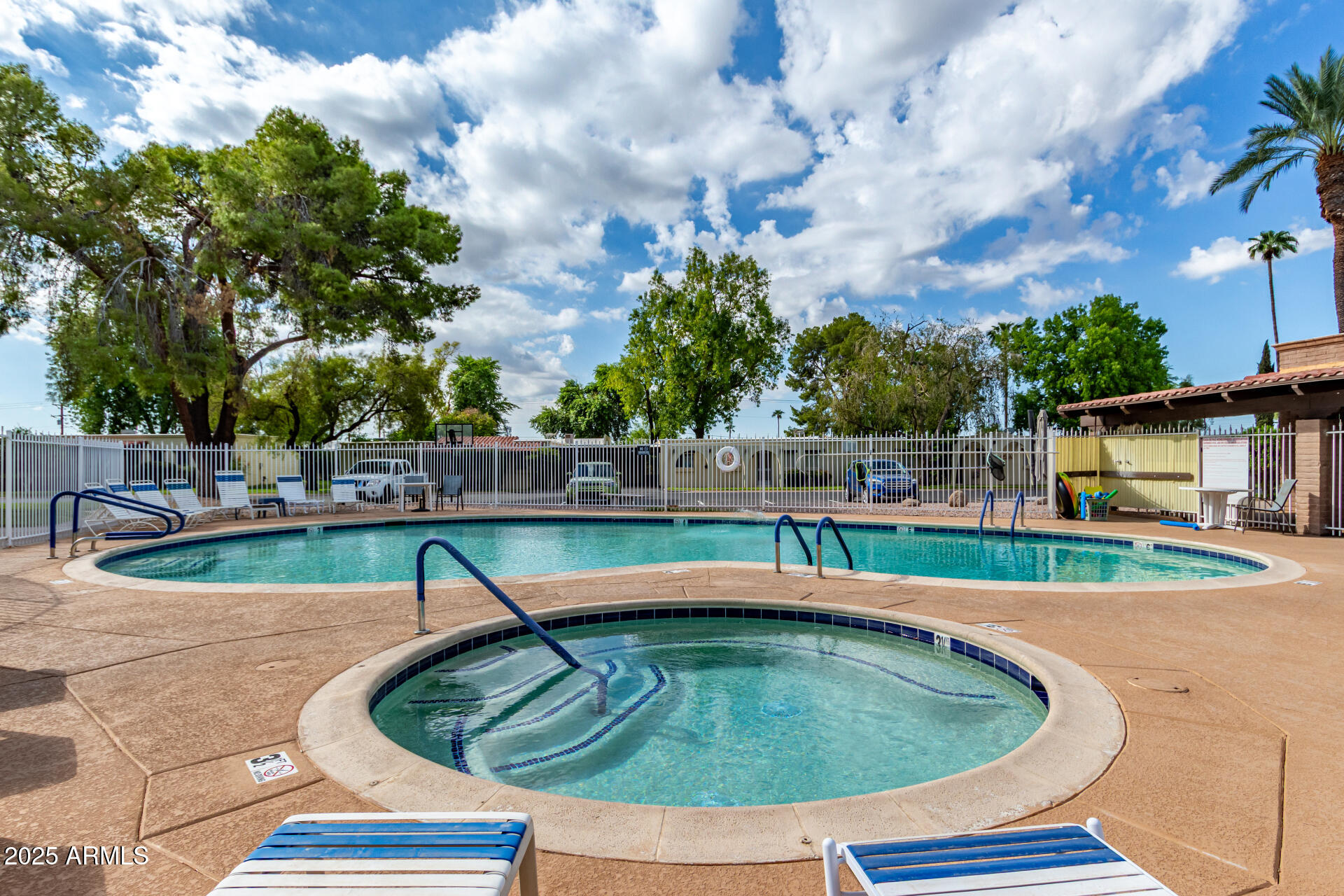 131 North Higley Road, Unit 1 Mesa, AZ 85205 - Photo 26 of 32 a view of outdoor space yard and swimming pool