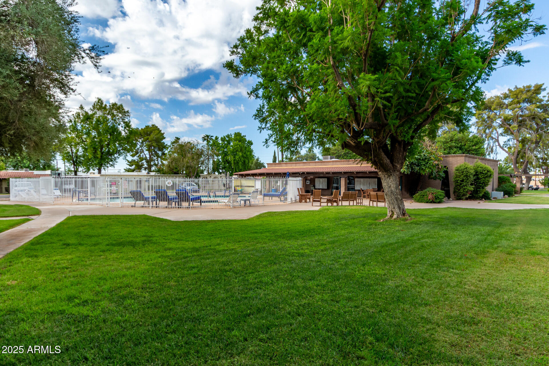 131 North Higley Road, Unit 1 Mesa, AZ 85205 - Photo 27 of 32 a front view of a house with garden