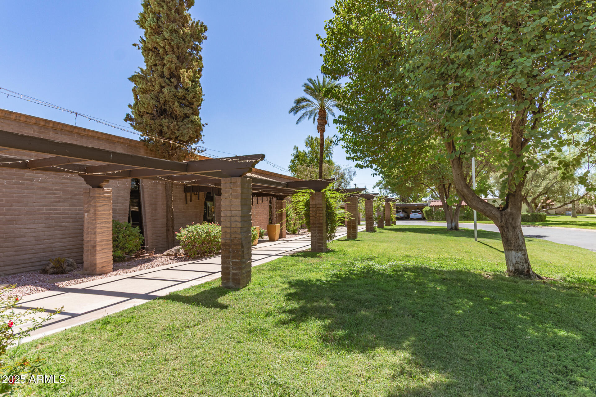 131 North Higley Road, Unit 1 Mesa, AZ 85205 - Photo 32 of 32 front view of a house with a yard
