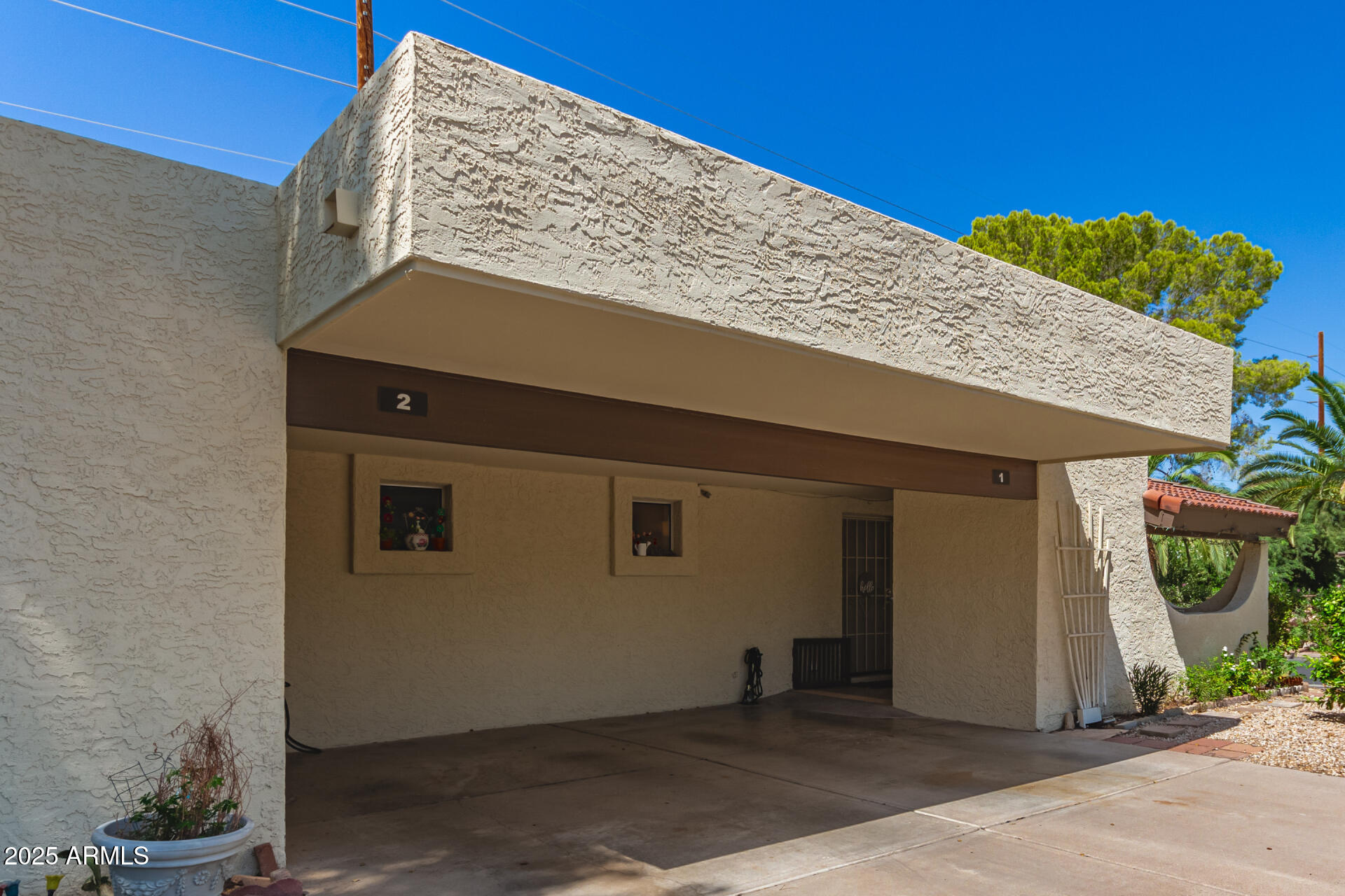 131 North Higley Road, Unit 1 Mesa, AZ 85205 - Photo 5 of 32 a view of a house with a door