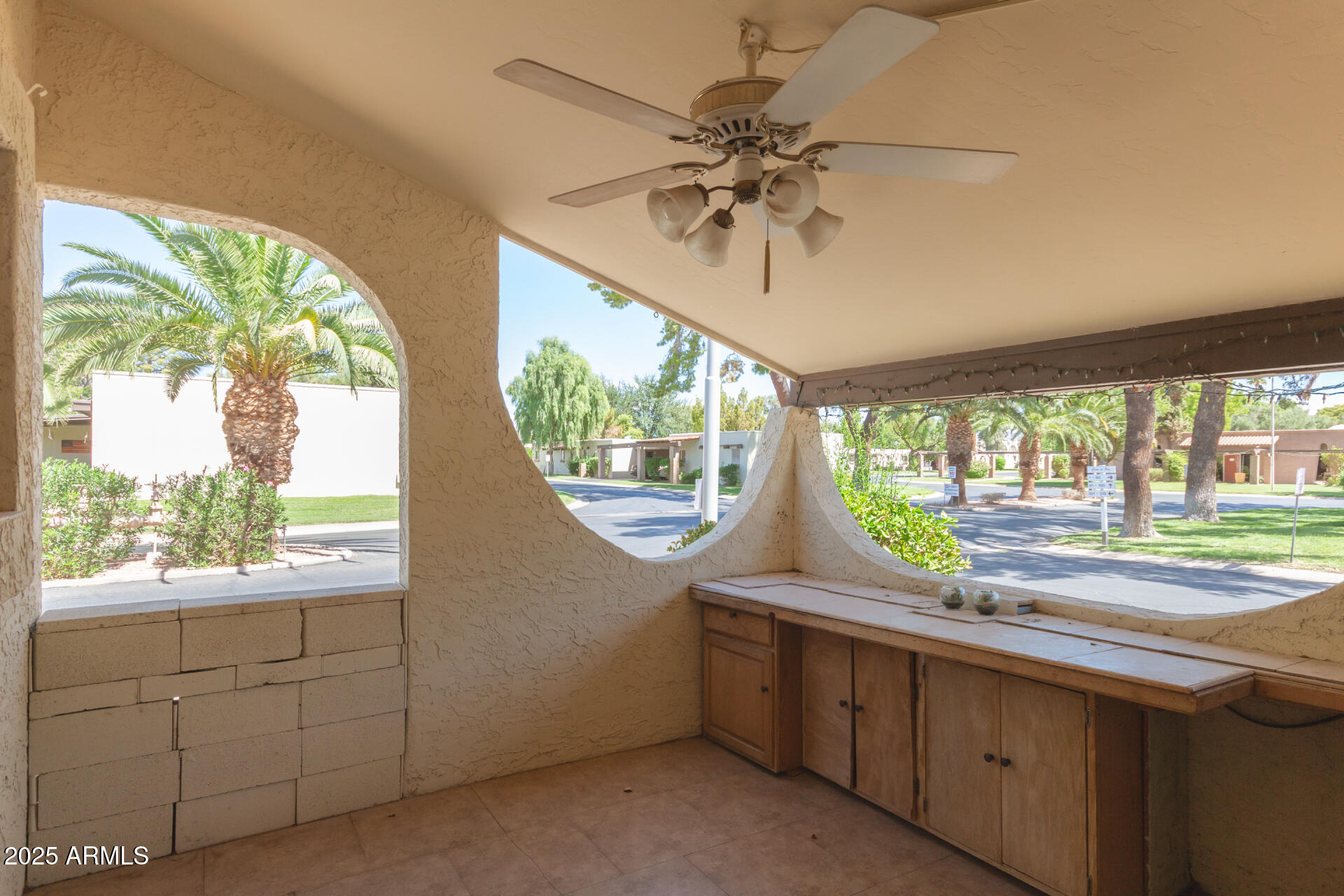 131 North Higley Road, Unit 1 Mesa, AZ 85205 - Photo 7 of 32 a view of a kitchen with a sink and a large window