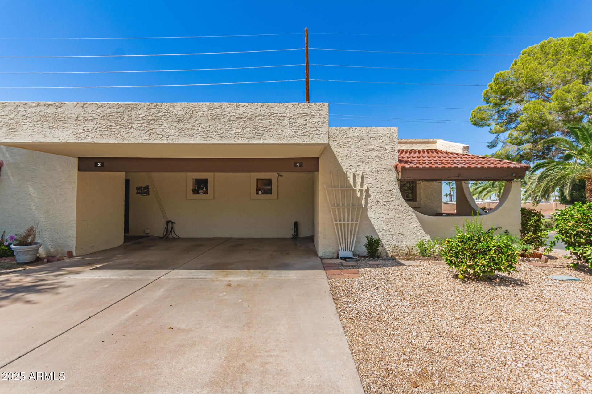 131 North Higley Road, Unit 1 Mesa, AZ 85205 - Photo 8 of 32 a front view of a house with a yard