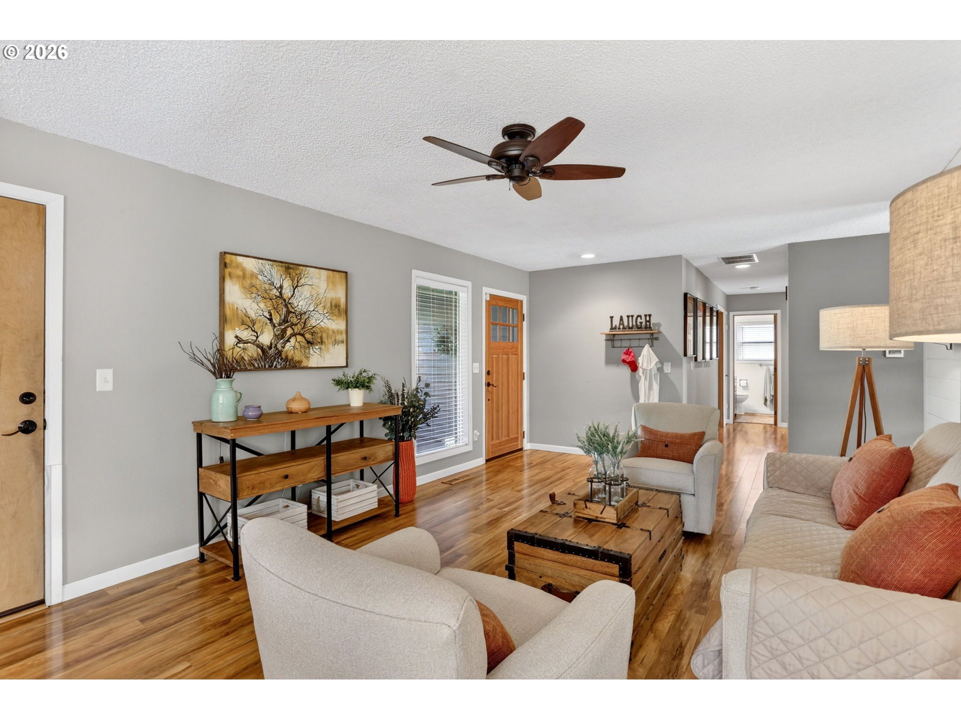 1776 Southeast 114th Place Portland, OR 97216 - Photo 13 of 47 a living room with furniture and a wooden floor