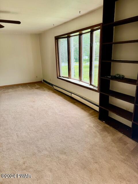 164 Tuthill Road Waymart, PA 18472 - Photo 8 of 33 a view of an empty room with a window