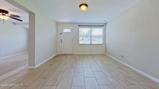 a view of a livingroom with a window