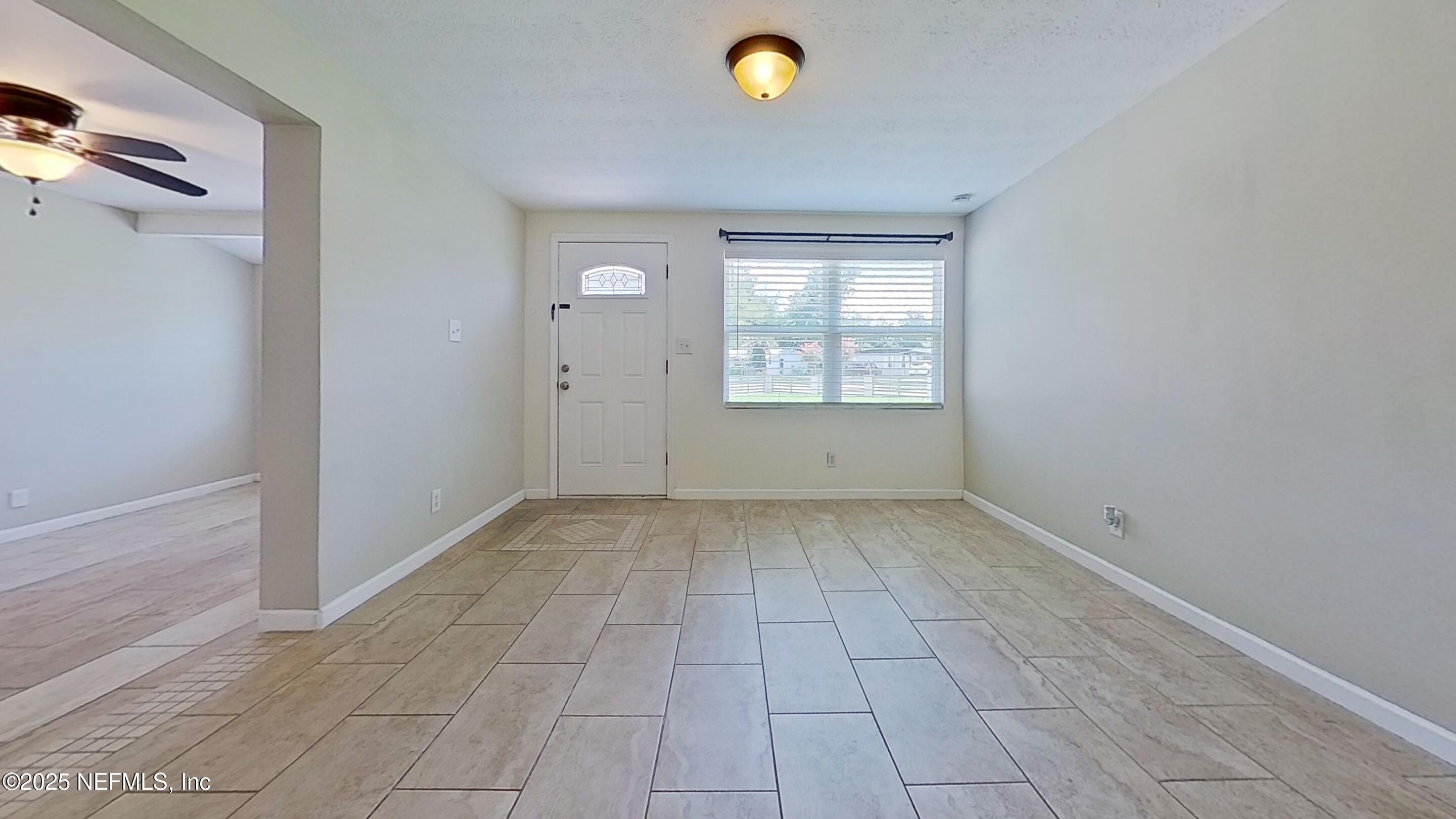 399 Toccoa Road Orange Park, FL 32073 - Photo 11 of 31 a view of a livingroom with a window