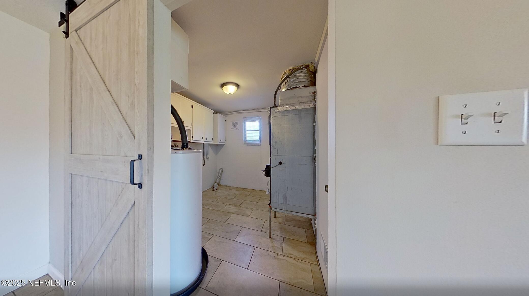 399 Toccoa Road Orange Park, FL 32073 - Photo 18 of 31 a view of a hallway with wooden floor and entryway