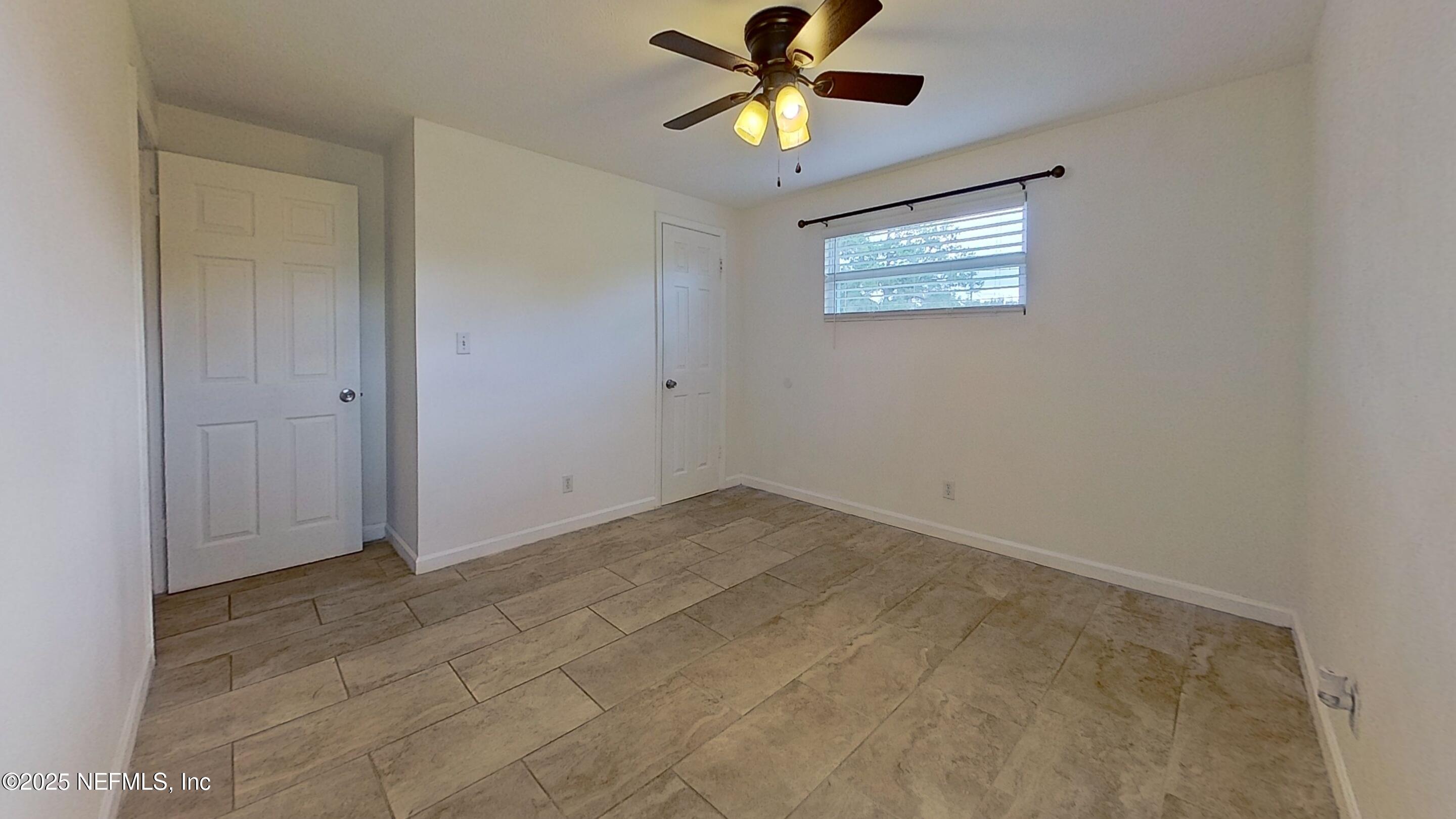 399 Toccoa Road Orange Park, FL 32073 - Photo 22 of 31 a view of an empty room and window