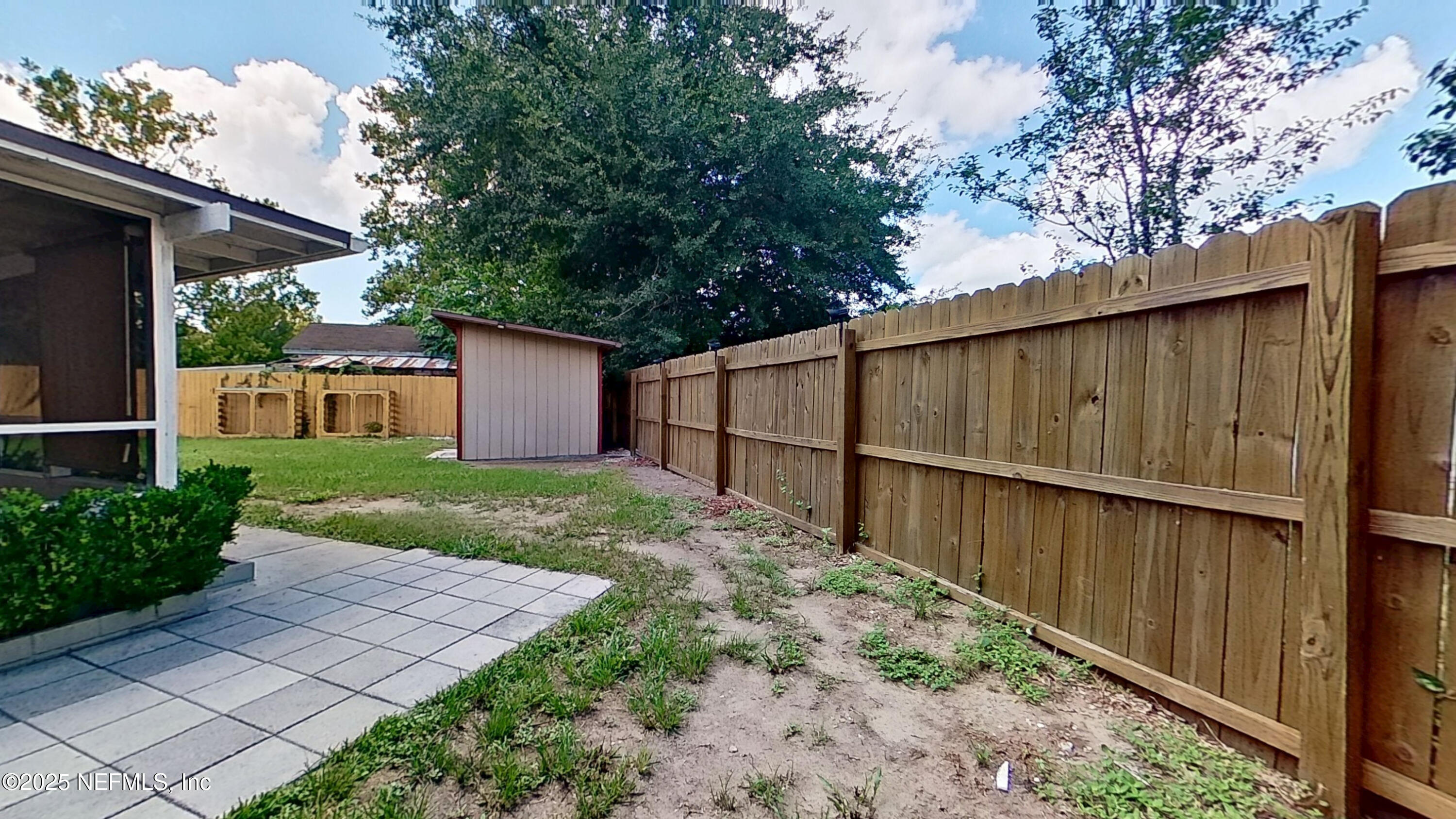 399 Toccoa Road Orange Park, FL 32073 - Photo 31 of 31 a view of a backyard with potted plants