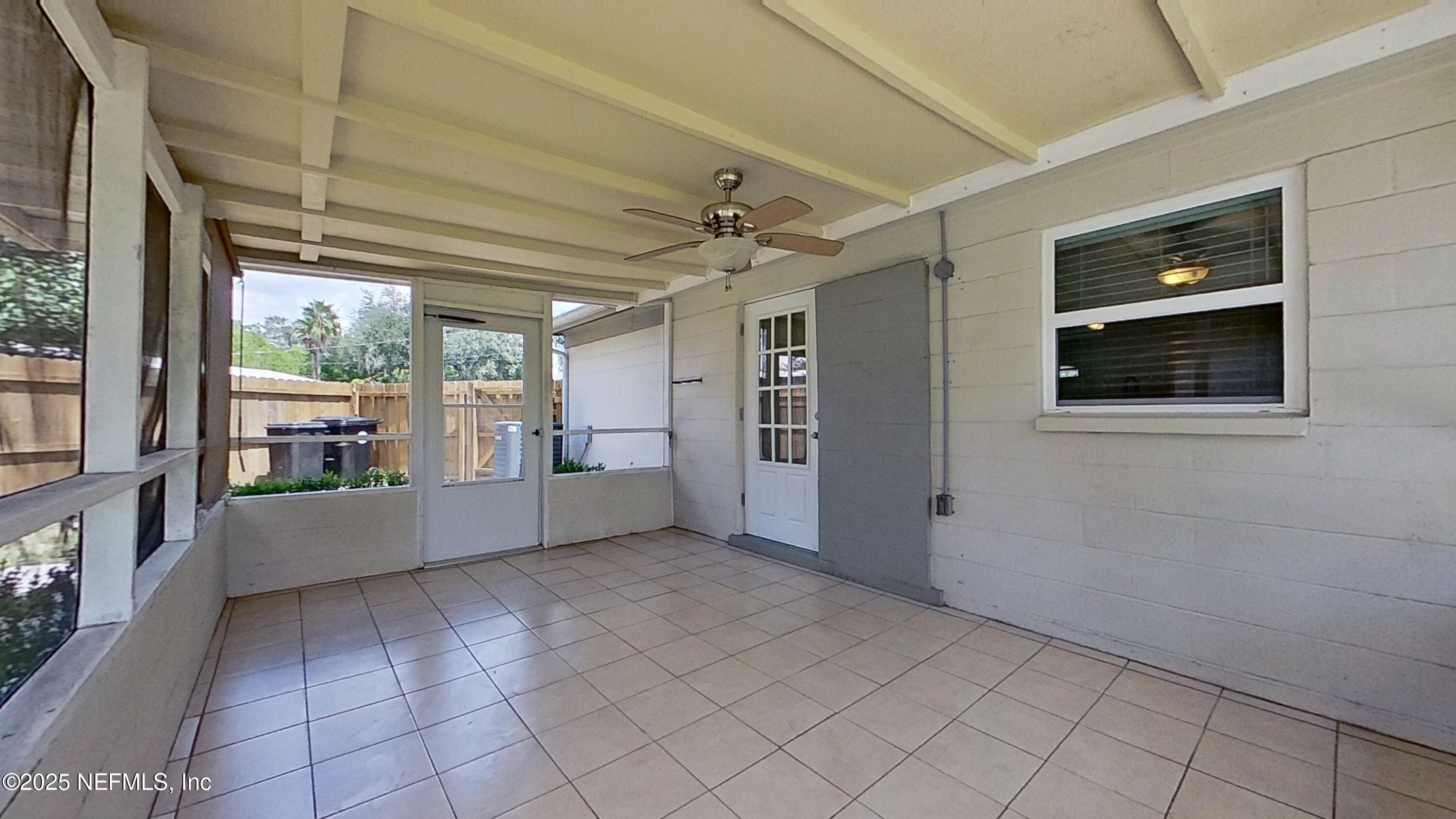 399 Toccoa Road Orange Park, FL 32073 - Photo 6 of 31 a view of a kitchen with furniture and windows