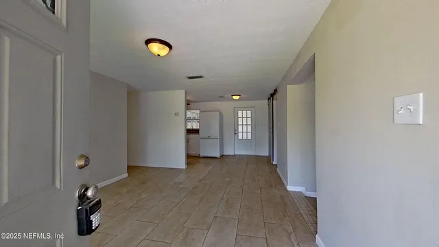 a view of a livingroom with a bathroom