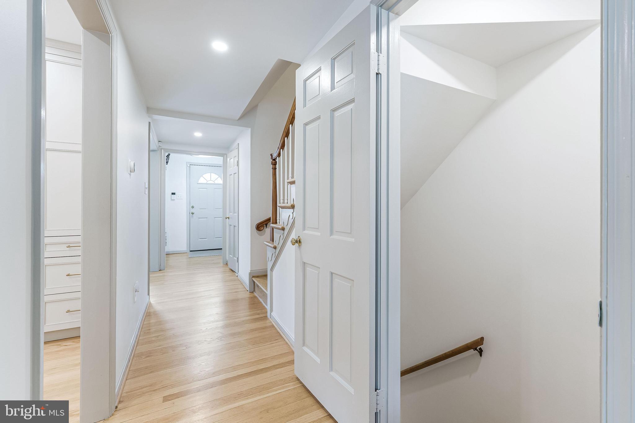 1151 Randolph Road McLean, VA 22101 - Photo 6 of 65 Hallway to family room & basement stairway