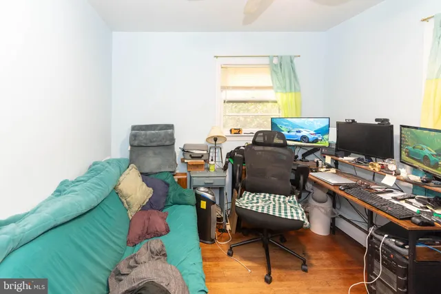 a workspace with furniture and a window