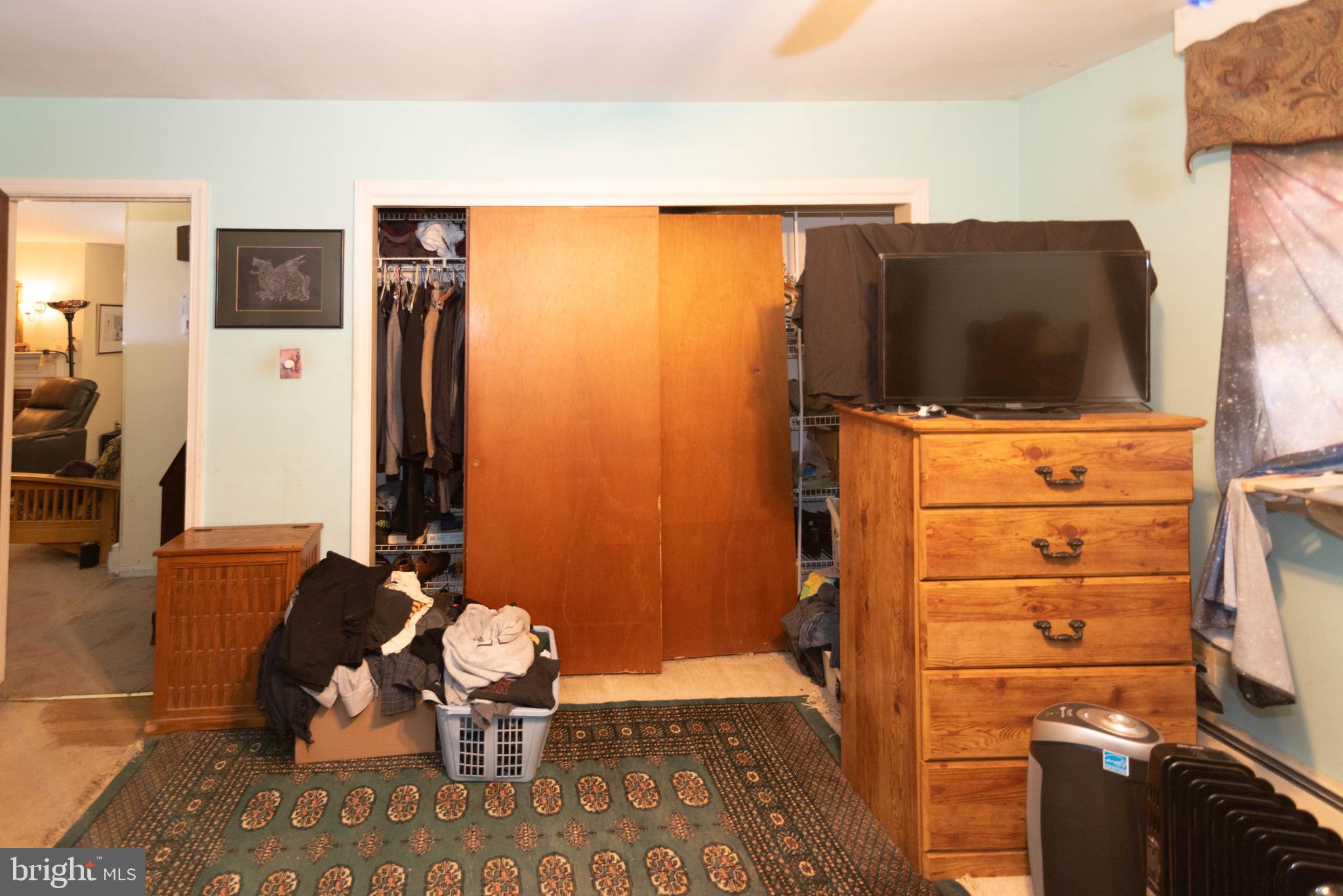 3270 Woodcox Road Indian Head, MD 20640 - Photo 21 of 49 a living room with furniture and a flat screen tv
