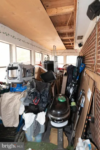 a living room with lots of furniture and a window