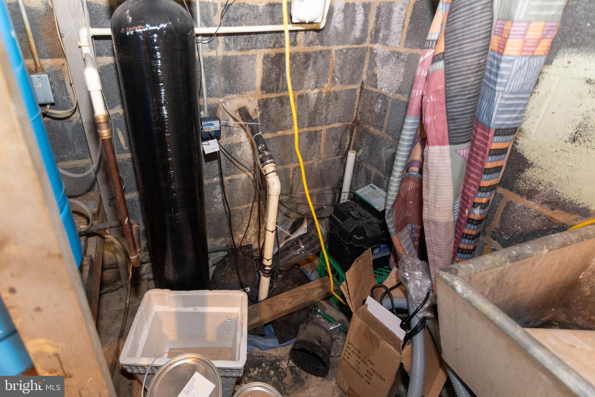3270 Woodcox Road Indian Head, MD 20640 - Photo 43 of 49 a view of walk in closet with clothes and water camper