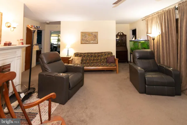 a living room with furniture and a couch