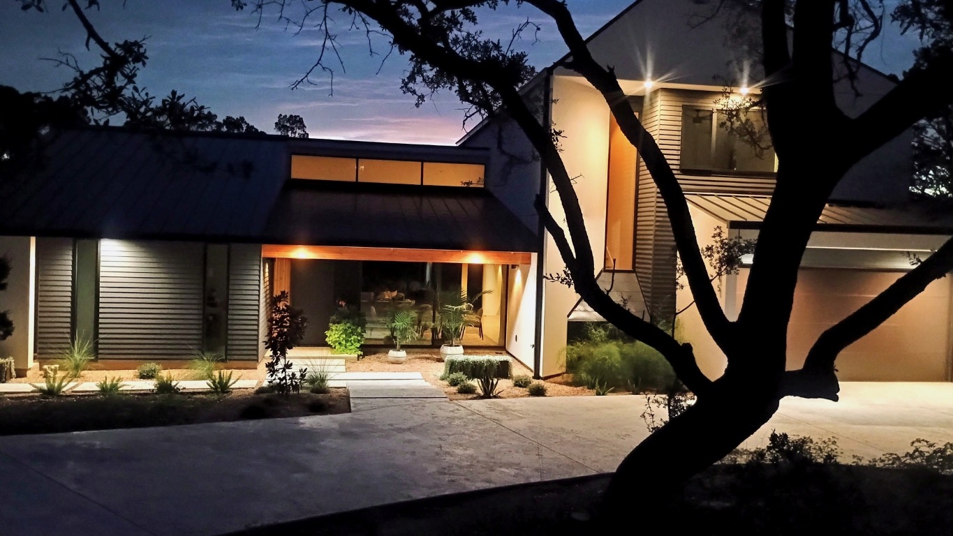 a view of a porch with a table and chairs