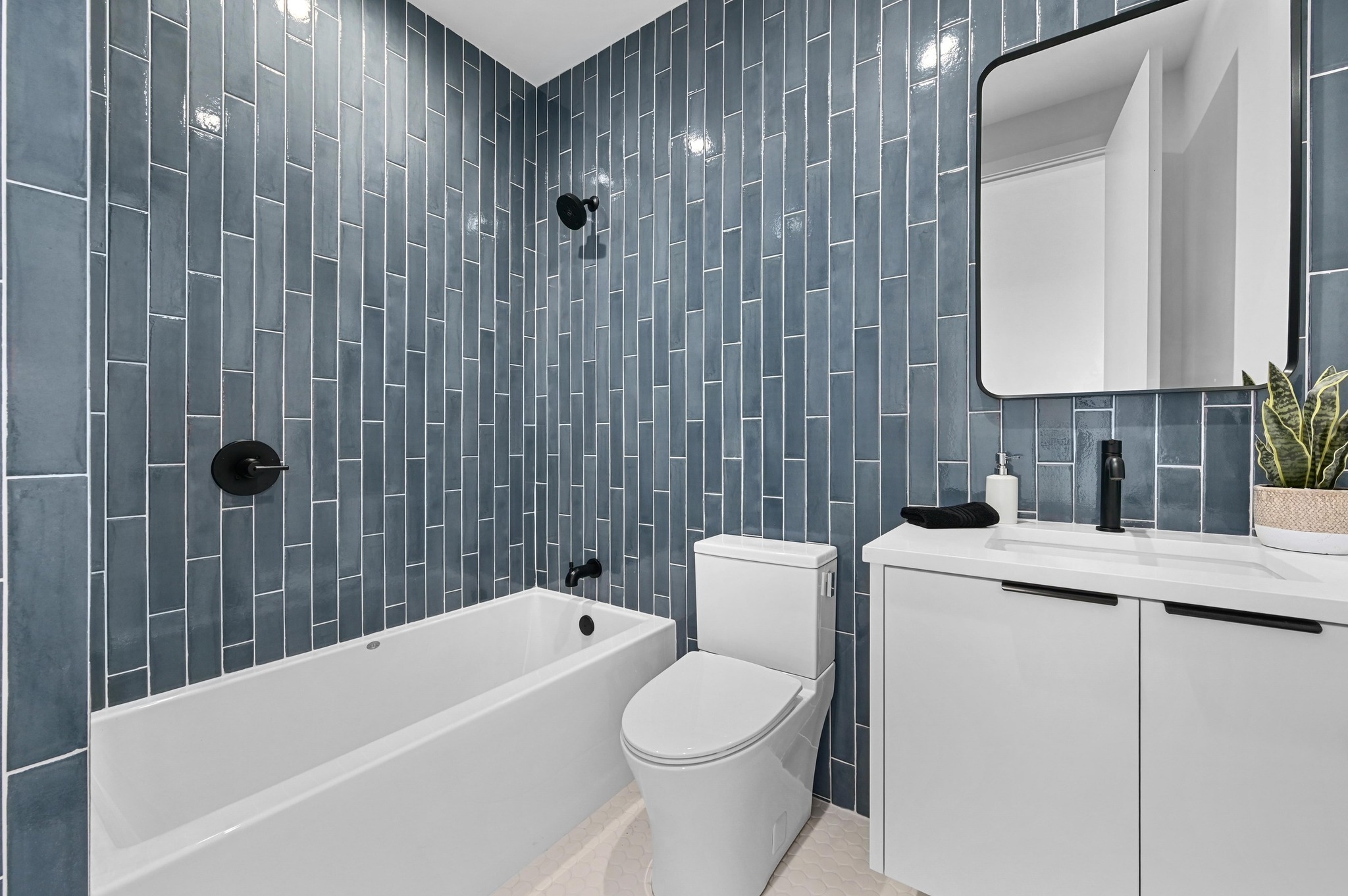 18845 Hidden Ridge Place Jonestown, TX 78645 - Photo 24 of 36 a bathroom with a sink a toilet and shower