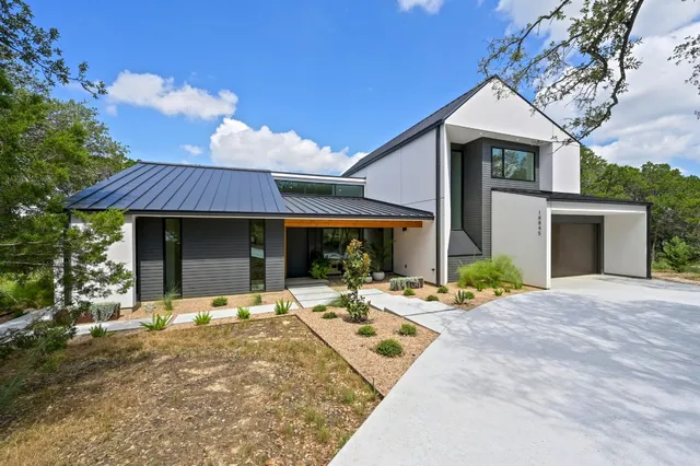 a front view of a house with patio