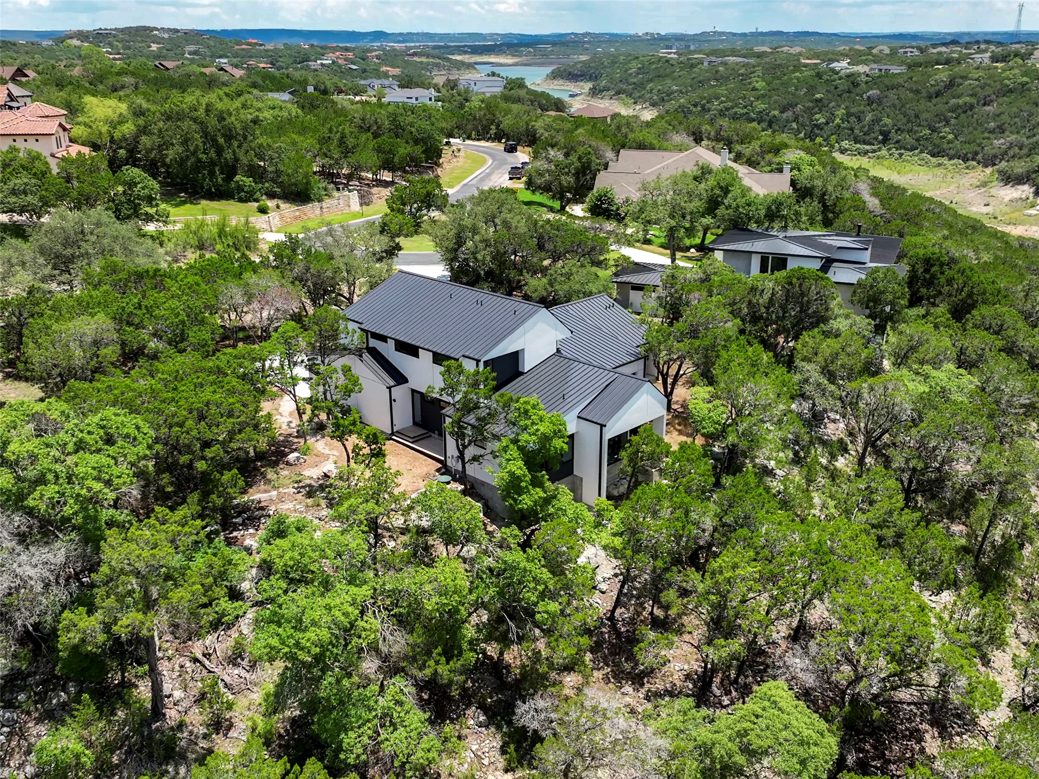 18845 Hidden Ridge Place Jonestown, TX 78645 - Photo 5 of 36 an aerial view of a houses with a yard