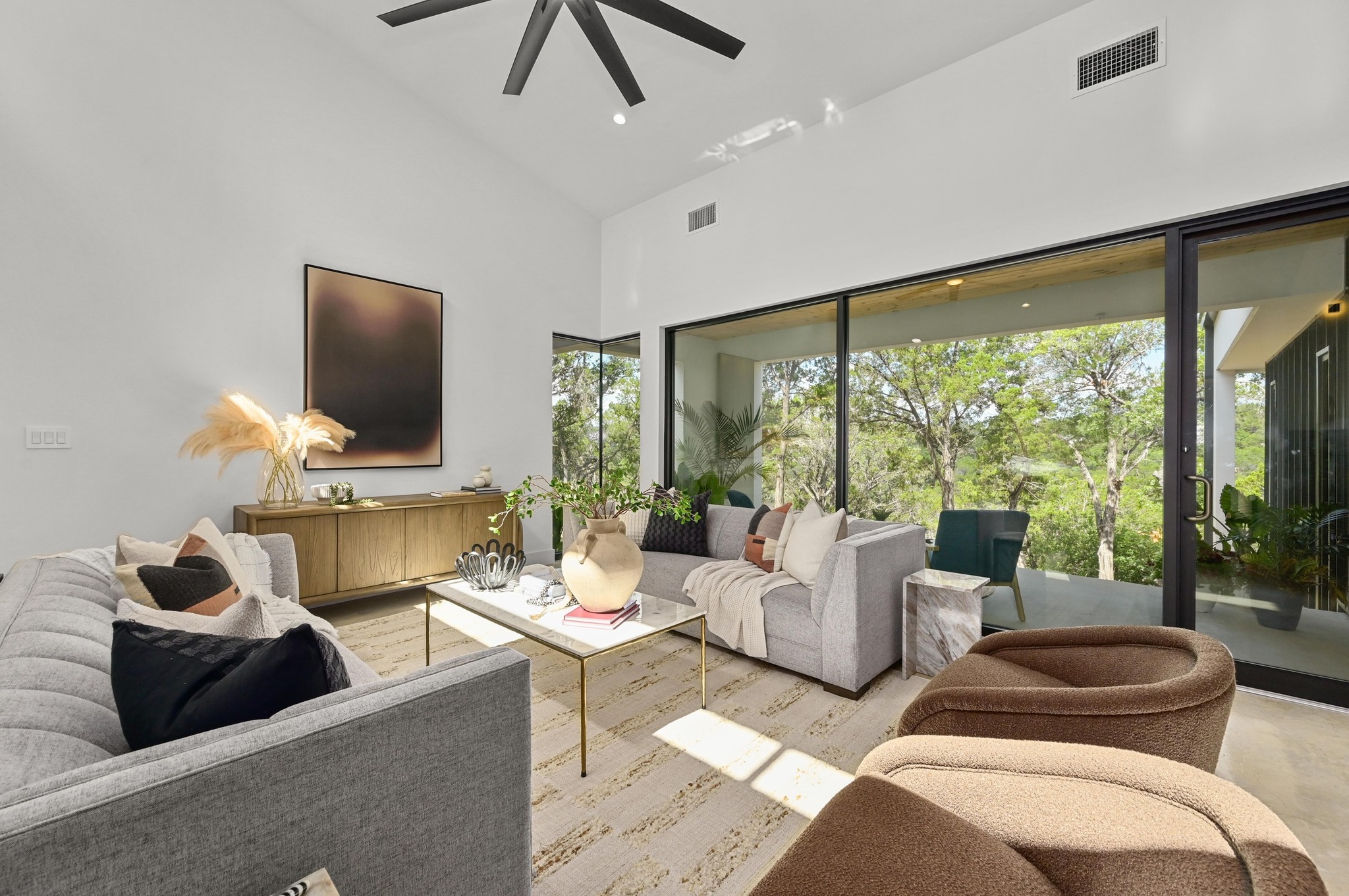 18845 Hidden Ridge Place Jonestown, TX 78645 - Photo 10 of 36 a living room with furniture and a large window