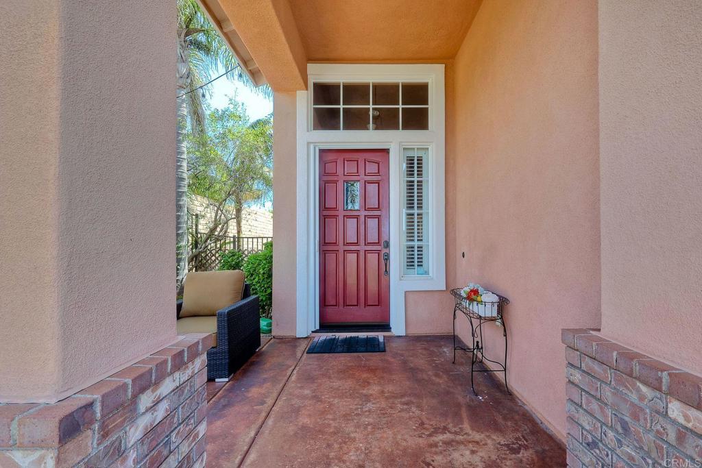 6738 Solandra Drive Carlsbad, CA 92011 - Photo 4 of 11 a view of front door of house