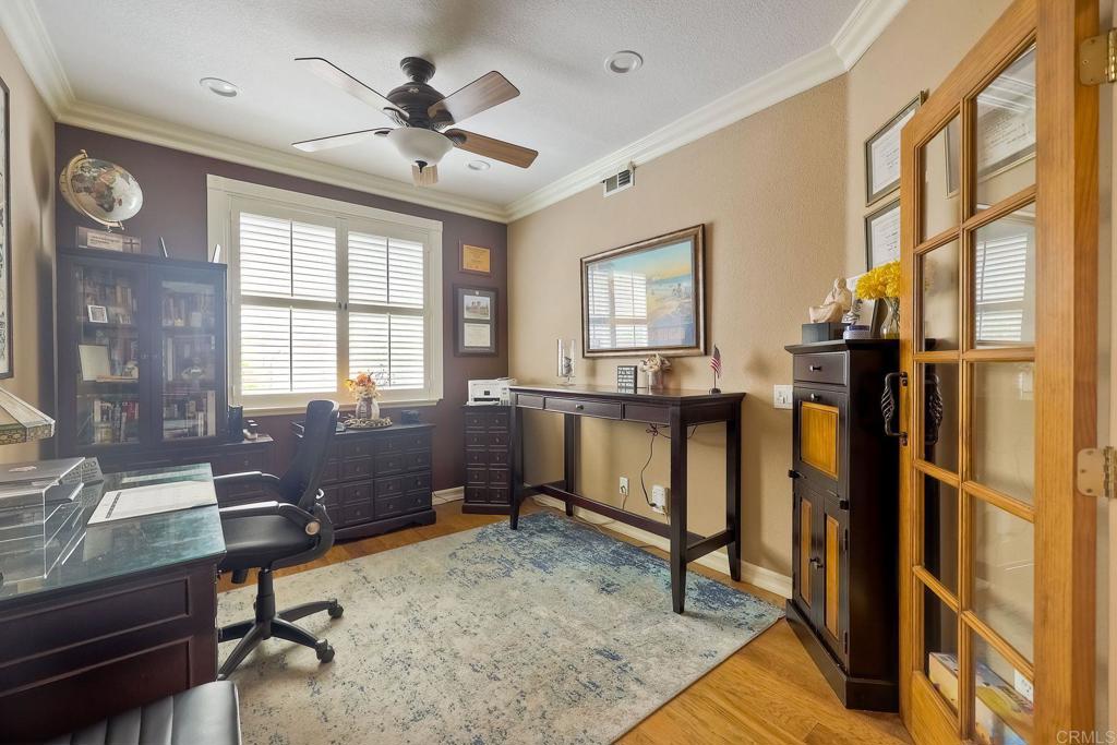 6738 Solandra Drive Carlsbad, CA 92011 - Photo 9 of 11 a view of a livingroom with furniture and a window