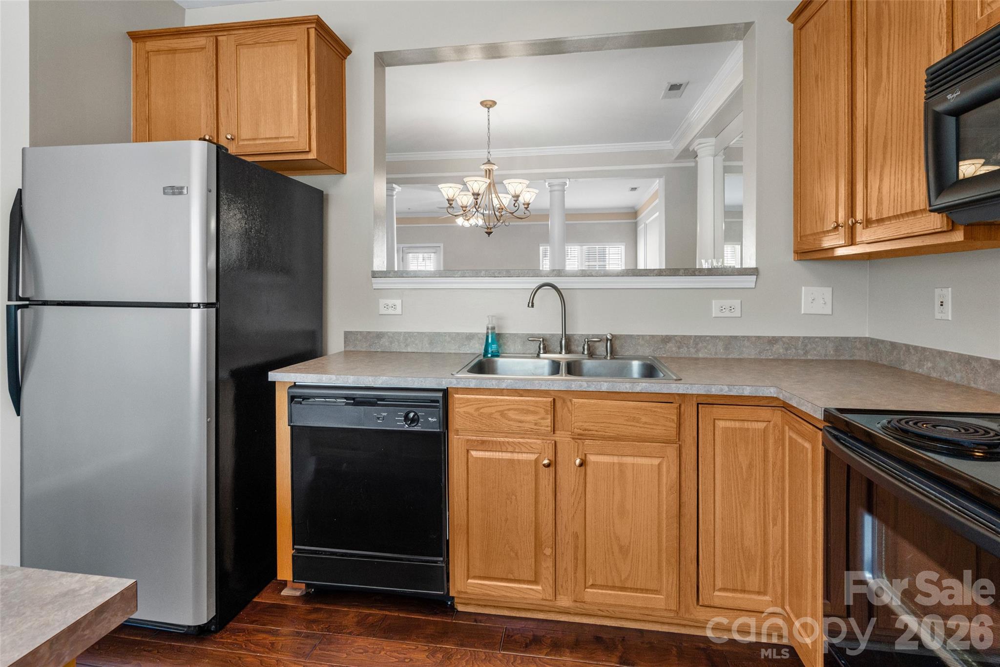 104 Rock Ridge Lane Mount Holly, NC 28120 - Photo 20 of 48 a kitchen with stainless steel appliances granite countertop a refrigerator and a sink